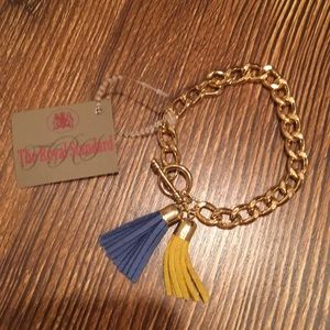 Gold bracelet with yellow/blue tassels